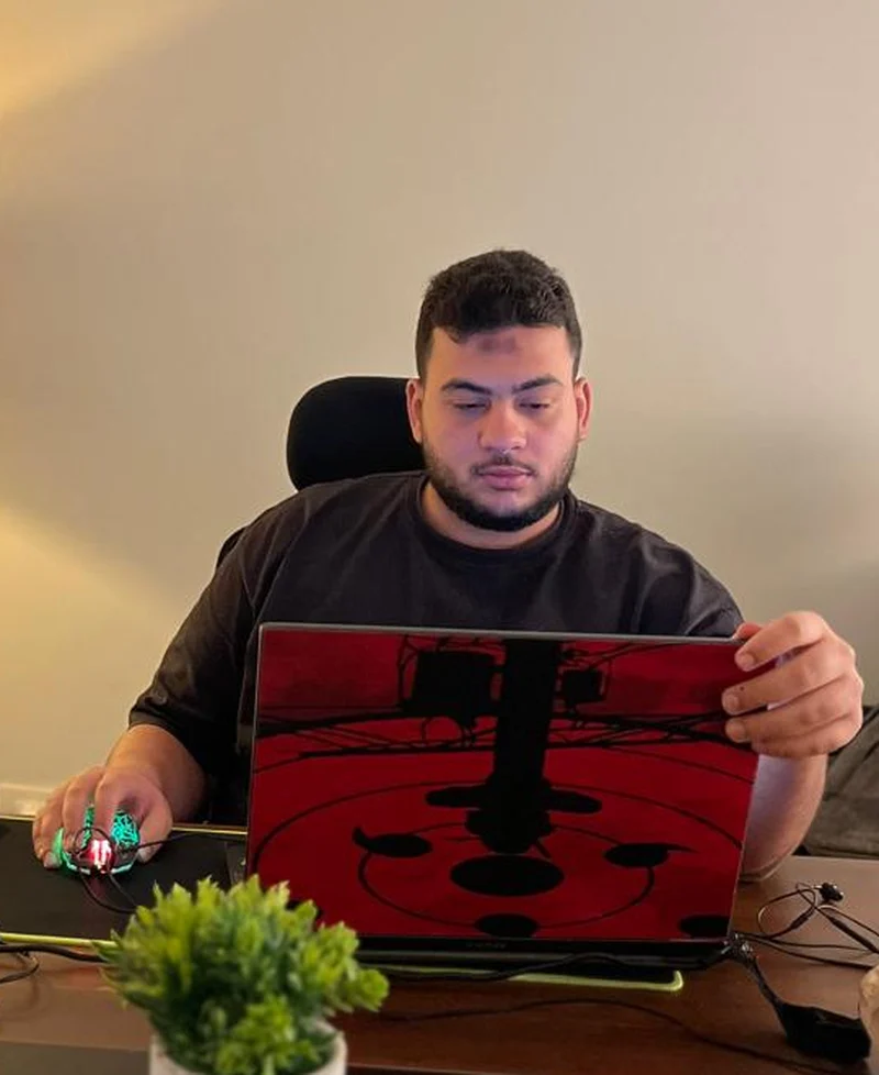 Mohamed Khaled working at his desk